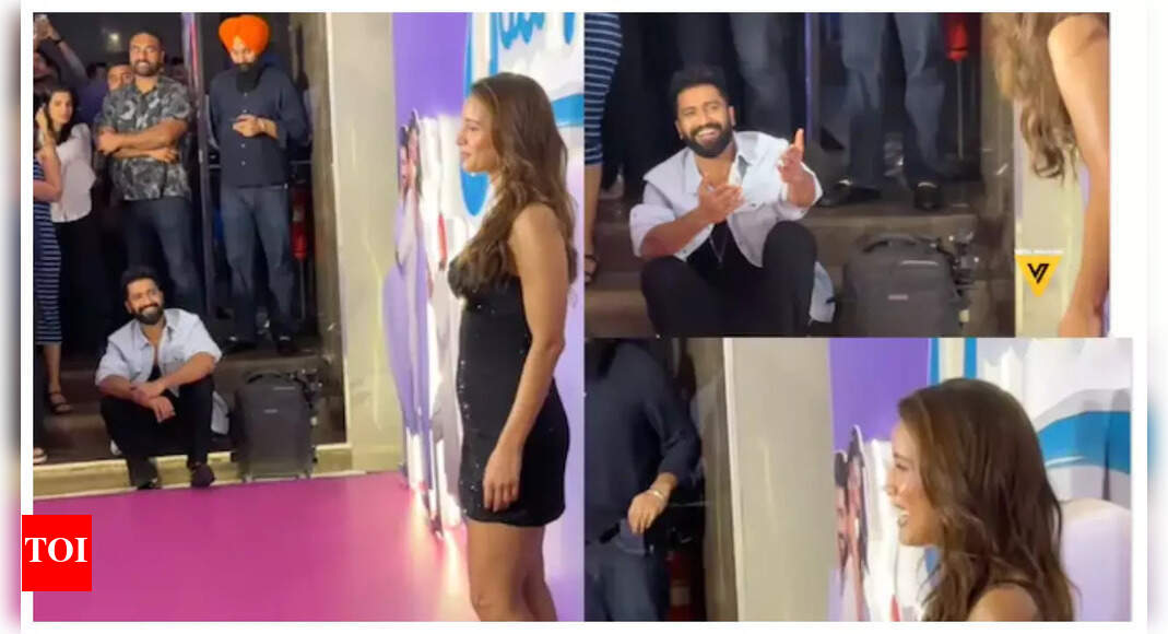 Hilarious video of Vicky Kaushal patiently waiting for Triptii Dimri as she poses for paparazzi at the red carpet goes viral - WATCH |