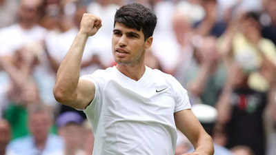 Carlos Alcaraz begins Wimbledon title defence with win over Mark Lajal