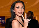 Kim Kardashian jokes she ‘might have lasted longer’ on DWTS if she had 'shots’ as she dances at Khloé’s 40th
