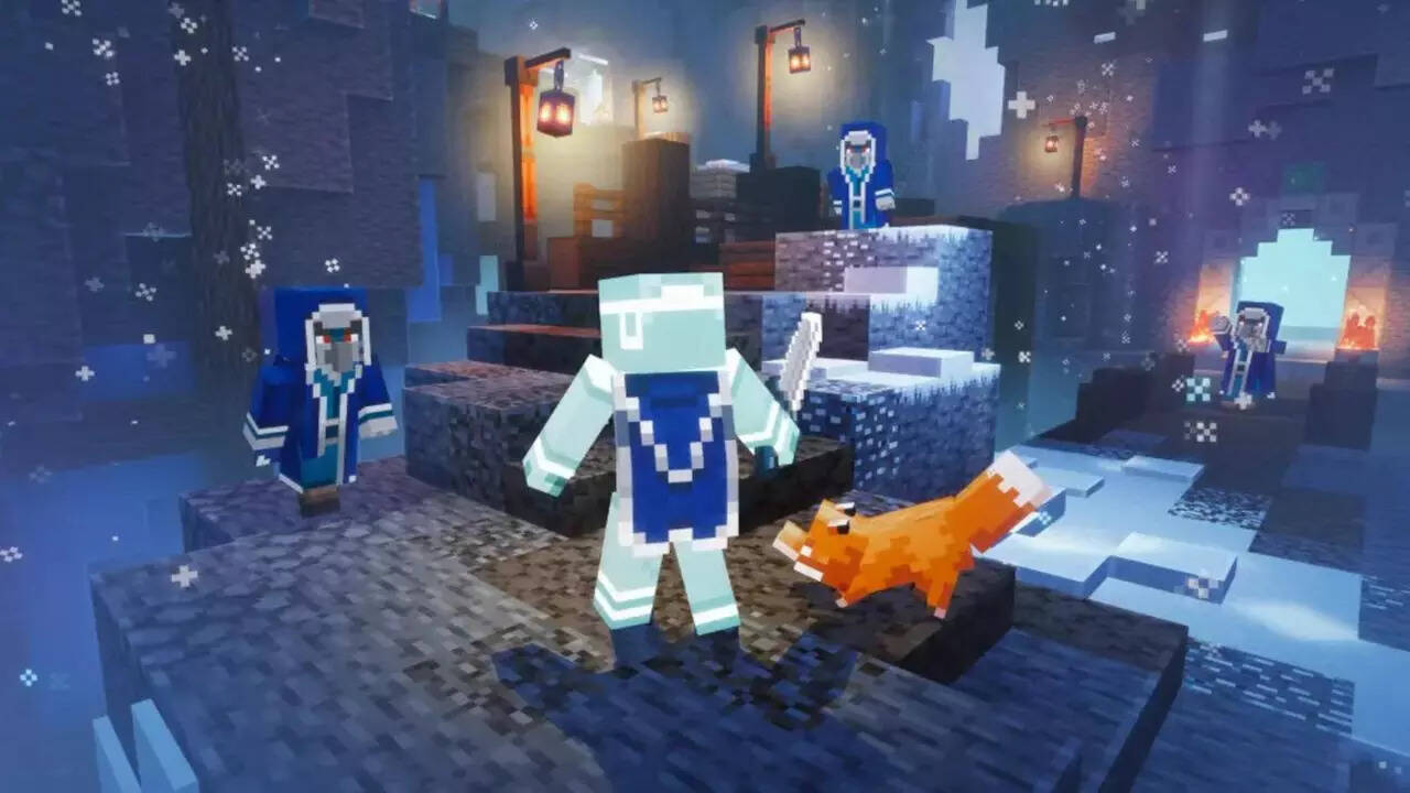 A frosty Minecraft cavern scene with blue tones and illuminated structures