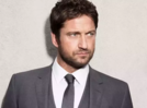 Gerard Butler gets cozy with a 29-year-old model in London