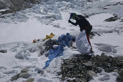 Mount Everest's highest camp littered with frozen garbage and decade ...