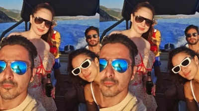 Triptii Dimri shares a boat ride with her rumored boyfriend Sam Merchant and close friends during a beach vacation