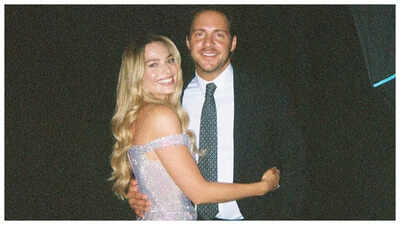 Margot Robbie pregnant with first child; debuts baby bump on holiday with husband Tom Ackerley - Pics Inside