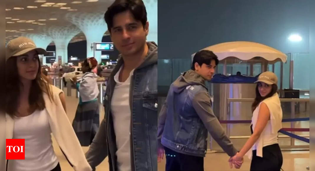 Sidharth Malhotra, Kiara Advani serve couple goals as they walk hand-in-hand at the airport, jet off to an undisclosed destination – WATCH video | Hindi Movie News