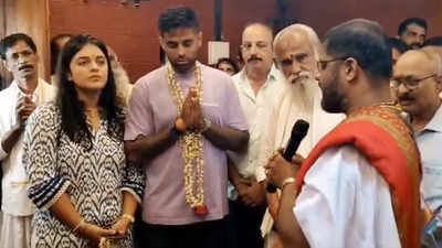 Suryakumar Yadav visits Marigudi temple with wife Devisha after T20 World  Cup triumph | Cricket News - Times of India