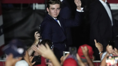 Barron Trump has father's grin: Body language expert on his first rally appearance