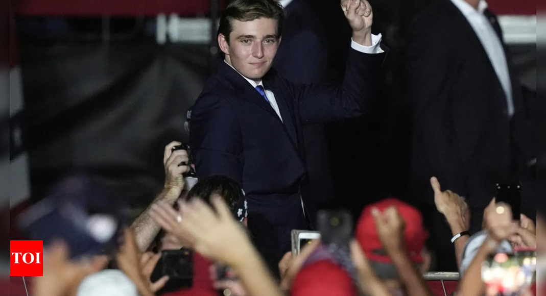 Barron Trump has father’s grin: Body language expert on his first rally appearance – Times of India