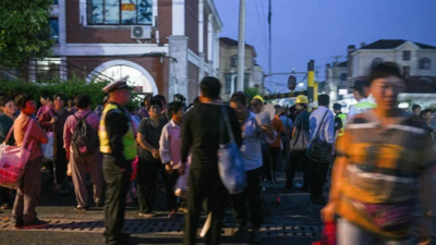 Day labourers seek dwindling jobs pre-dawn in Shanghai suburb - Times ...