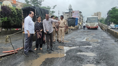 NHA officials assured to fill potholes on Shahad bridge after motorists complained