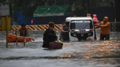 Monsoon: Typhoon Gaemi Floods Manila With Knee-deep Water, 16 Flights ...