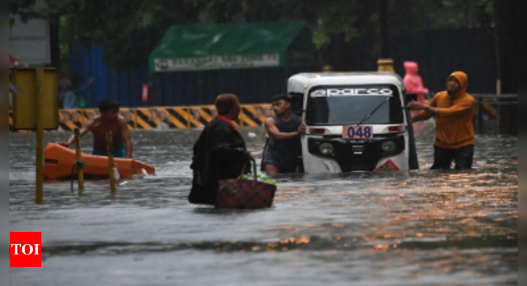 Typhoon Gaemi floods Manila with knee-deep water, 16 flights cancelled – Times of India