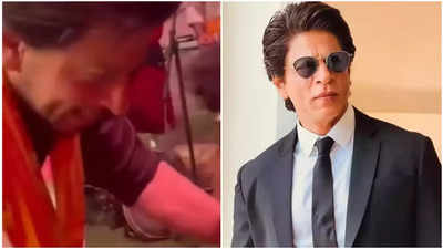 Shah Rukh Khan politely stops fan from touching his feet, offers gratitude; watch video here