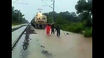 One step at a time, railway staff lead way for train on submerged tracks in Madhya Pradesh