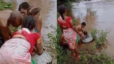 Viral video: Elderly woman crosses overflowing stream in cooking pot