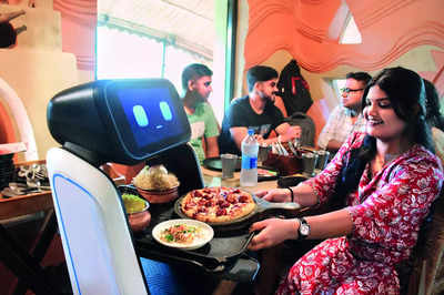 Robot servers are the top draw at a Nadia eatery