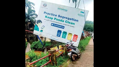 Heavy rain, winds tear down govt hoarding at Ponda