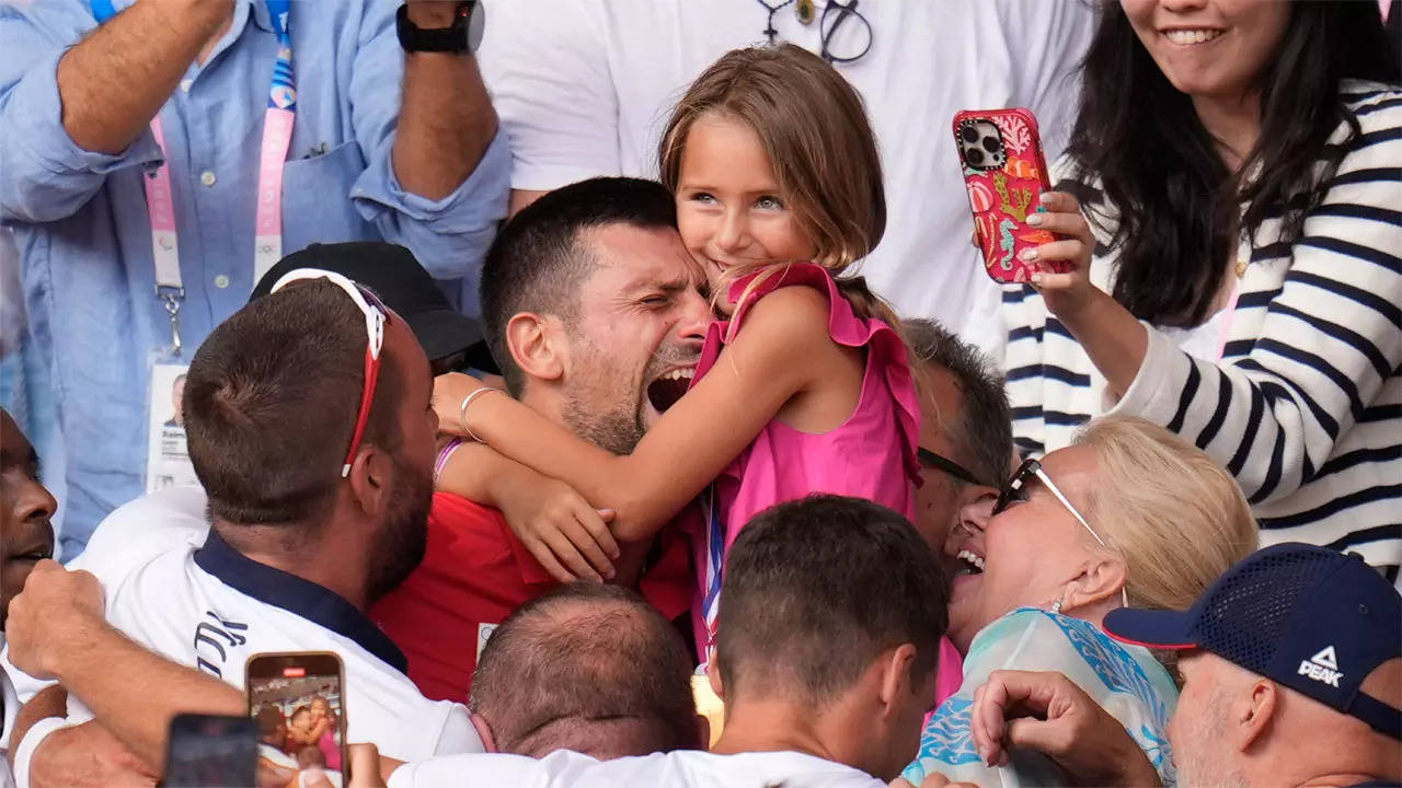 Viral Video: Tearful Novak Djokovic hugs daughter, family after claiming first-ever Olympic gold | Paris Olympics 2024 News - Times of India