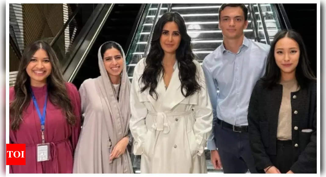 Katrina Kaif makes heads turn in this stunning ivory trench coat dress as she poses with fans in UNSEEN pic from Abu Dhabi | Hindi Movie News