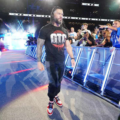 What is the meaning behind Roman Reigns' OTC T-shirt