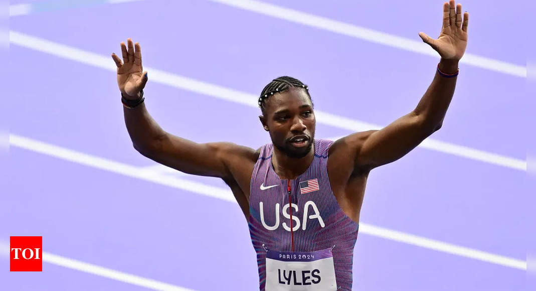 Noah Lyles eases through 200m heat in bid for sprint double at Paris