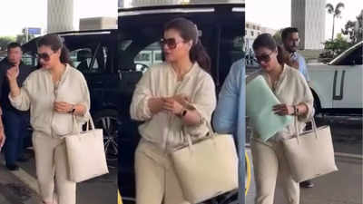 Watch: Kajol spotted at the airport heading out with mother Tanuja after celebrating 50th birthday