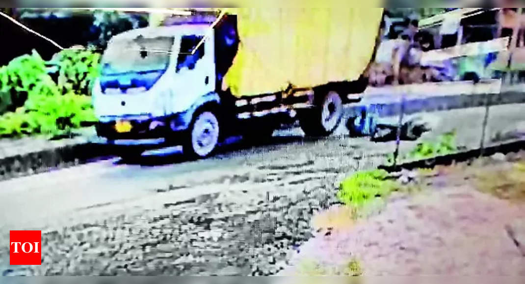 Girl hit by truck: Girl hit by truck while avoiding pothole | News from Surat