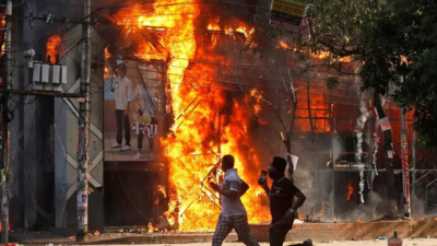 'Demoralised' police unable to rein in rioters across Bangladesh