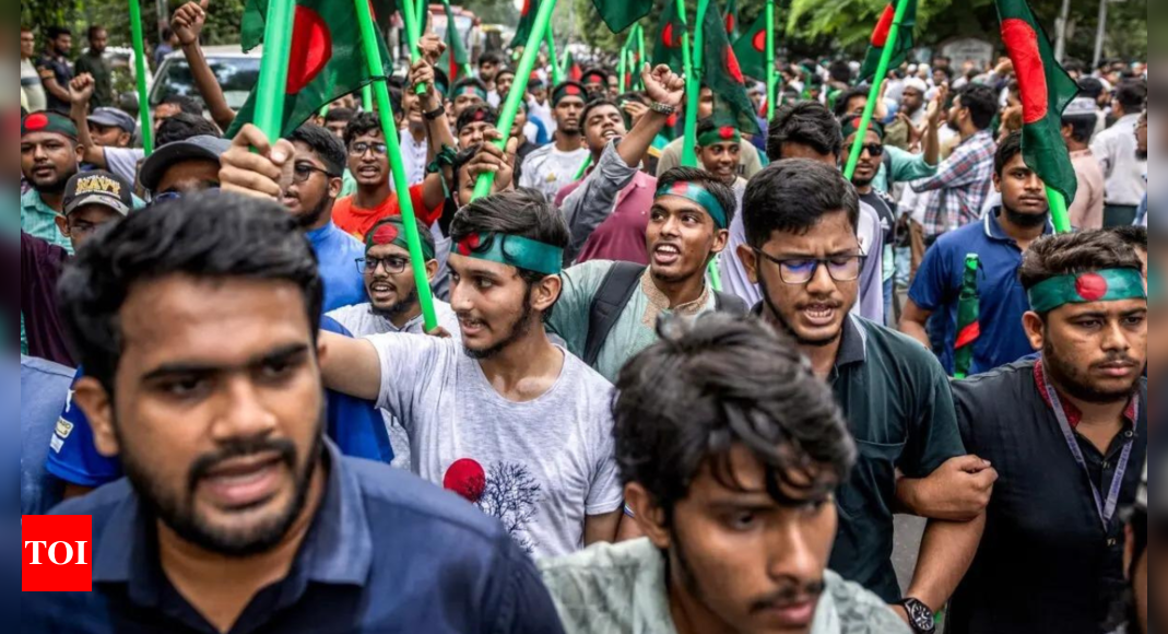 Mobs vowing to ‘guard revolution’ attack ex-Bangladesh PM Sheikh Hasina’s supporters with rods – Times of India