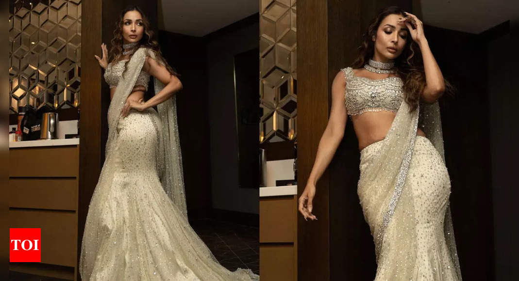 Malaika Arora stuns in custom-designed Swarovski crystal sari at IFFM 2024