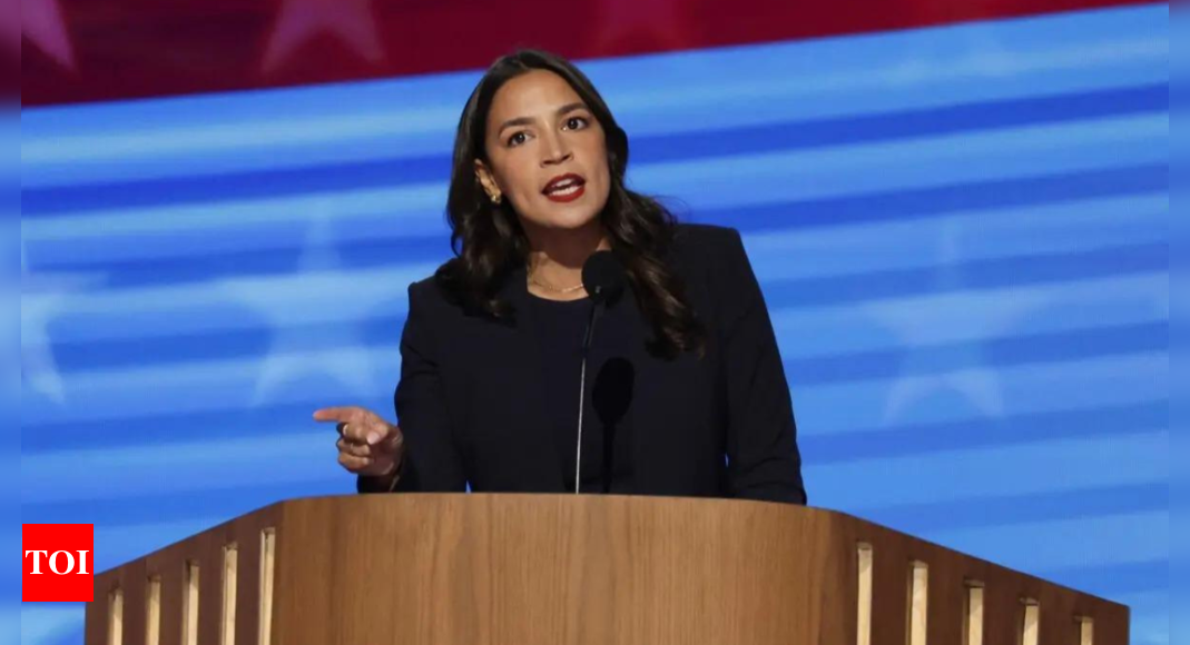 ‘Trump would sell this country for a dollar’: Alexandria Cortez blasts at Trump in a fiery speech at DNC – Times of India