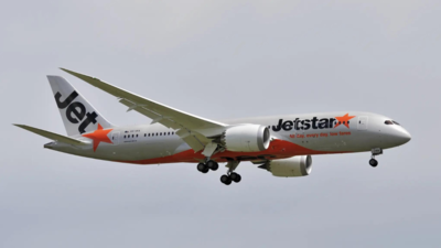 Man opens aircraft's emergency exit, walks on wing at Australian airport