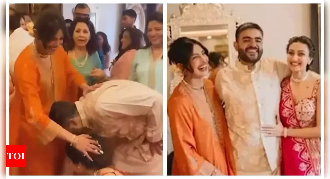 Priyanka Chopra looks gorgeous in orange kurta set as she blesses Siddharth Chopra and Neelam Upadhyaya on their engagement – WATCH inside video |