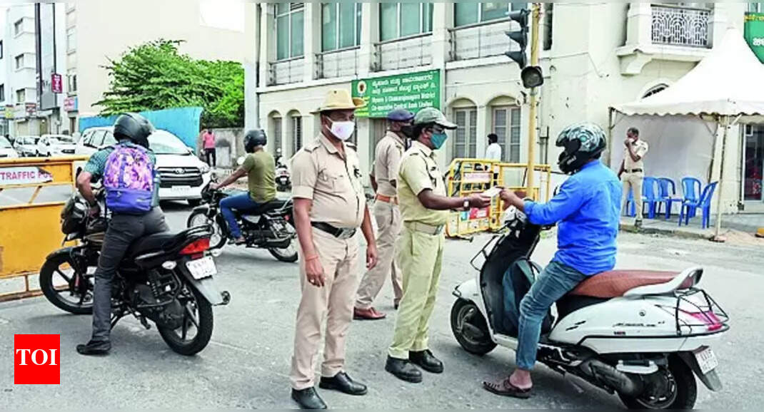 Traffic cops crack down on vehicles with defective number plates ...