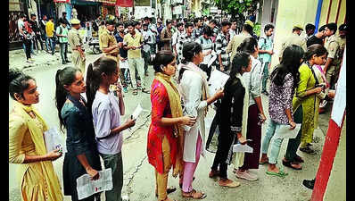 A young Raj is required to take an exam in place of another candidate