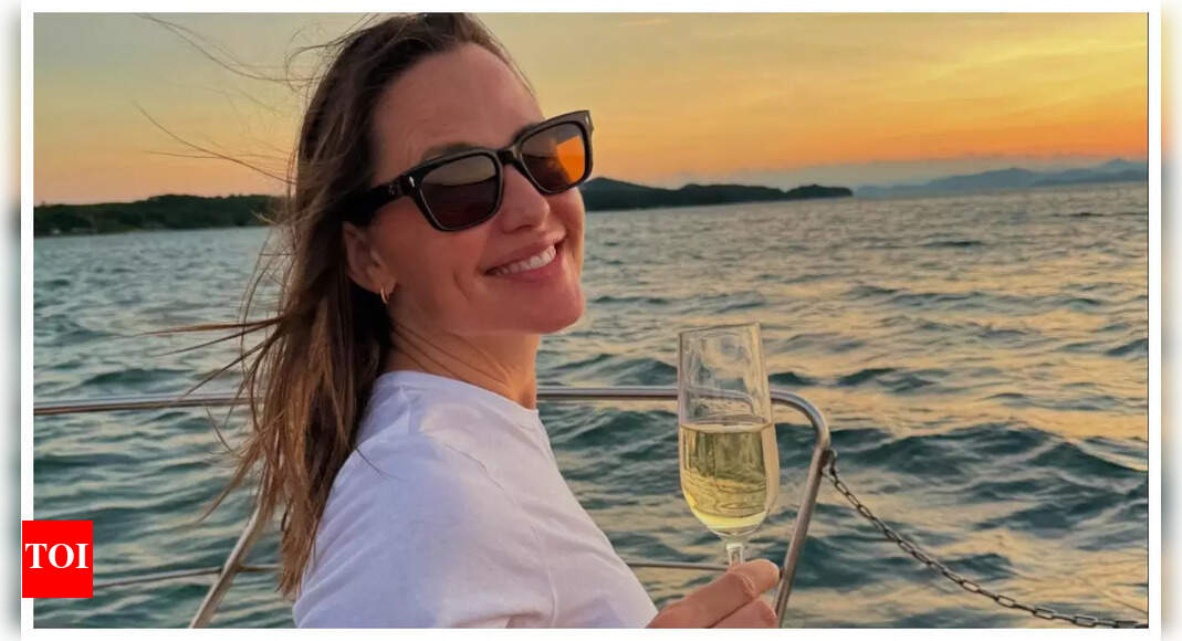 Jennifer enjoys a romantic night out with John Miller