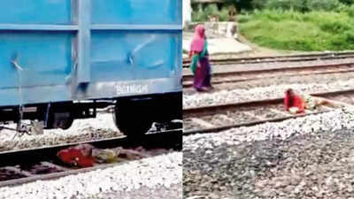 Caught on cam: Woman cheats death on railway track