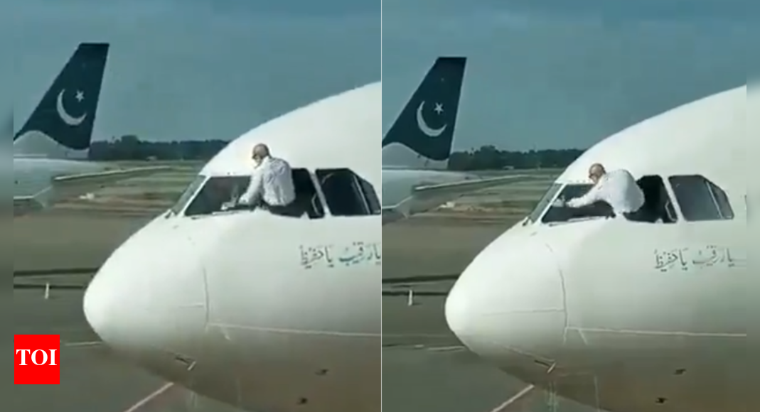 Watch: Pilot leans over, cleans window of aircraft before take off in Pakistan