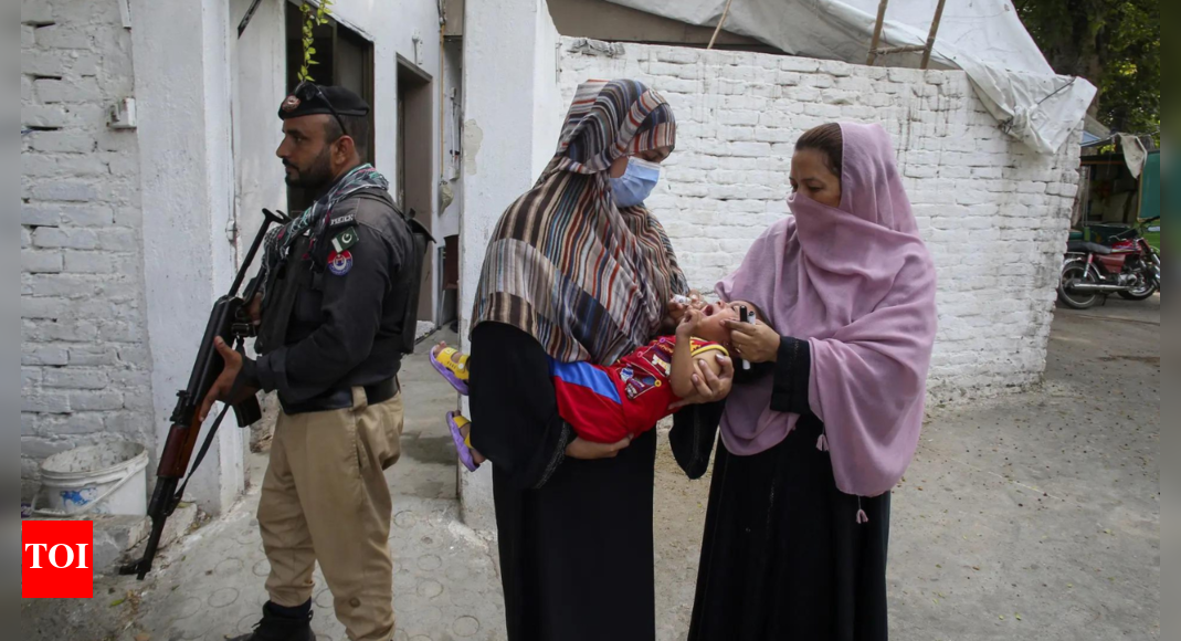 A roadside bomb hits a vehicle carrying police guarding an anti-polio drive in Pakistan, wounding 9