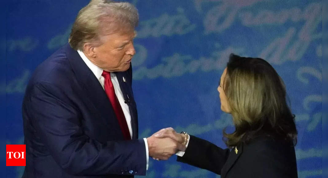 How tall is Kamala Harris? How much shorter is she than Donald Trump?