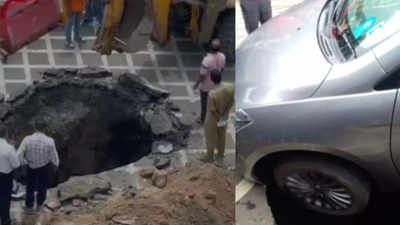 Watch: Car stuck in massive crater as road caves in at Mumbai's Dadar