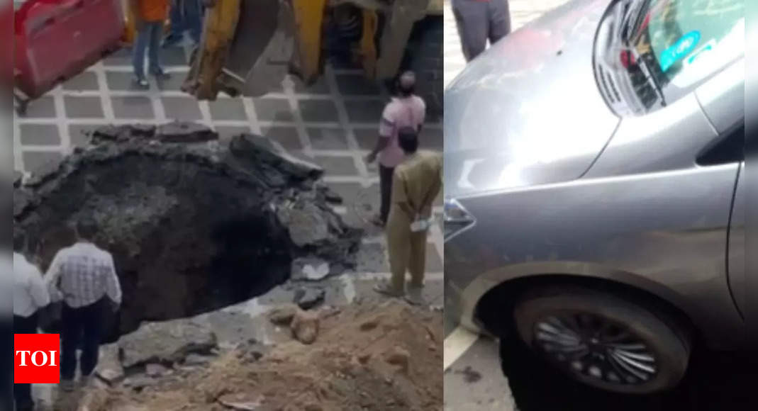 Watch: Car stuck in massive crater as road caves in at Mumbai’s Dadar | Mumbai News