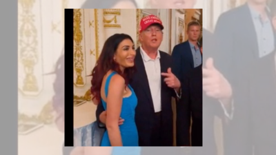 Laura Loomer's photo with Donald Trump viral. People ask where's Melania, where's wedding ring