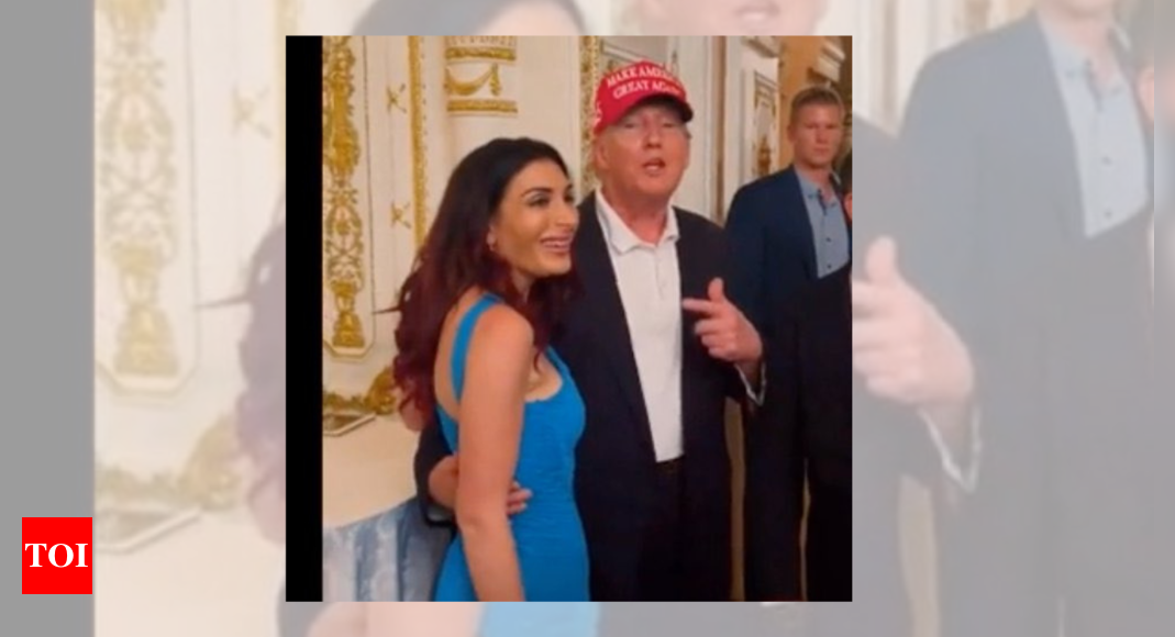 Laura Loomer’s photo with Donald Trump viral. People ask where’s Melania, where’s wedding ring – Times of India