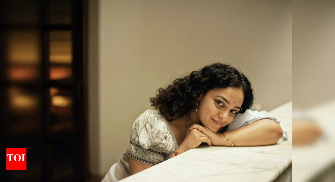 Onam means kasavu, sadhya & yellow flowers Nithya Menen Malayalam