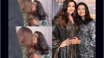 Aishwarya Rai kisses Aaradhya Bachchan at an award function; Abhishek Bachchan gives the event a miss