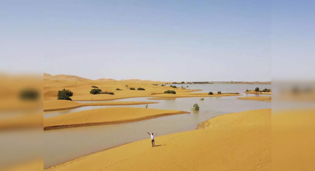 Rare rainfall transforms Sahara Desert, creating blue lagoons amid the sand dunes