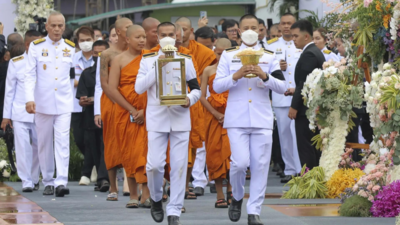 Small town in Thailand hold mass cremation for 23 who died in a school trip bus fire