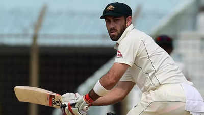 Glenn Maxwell prepares to return with the red ball