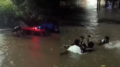 Watch: 3 rescued from submerged vehicle amid heavy rains in Madurai |  Madurai News - Times of India